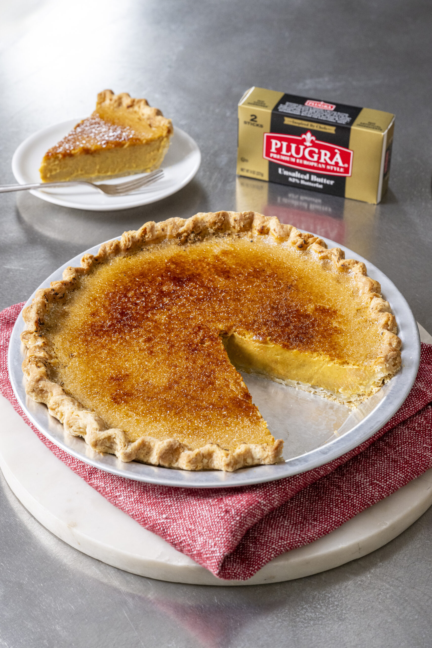 Gourmet Thanksgiving Recipes from Celebrity Chefs, Restaurateurs, and Culinary Experts - Maple Pumpkin Pie with Cognac by Chef Michelle Palazzo - Image credit: Plugrà European Style Butter