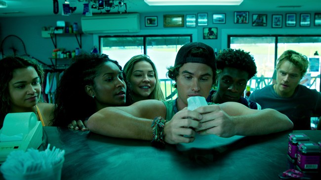 Outer Banks. (L to R) Madison Bailey as Kiara, Carlacia Grant as Cleo, Madelyn Cline as Sarah Cameron, Chase Stokes as John B, Jonathan Daviss as Pope, Rudy Pankow as JJ in episode 401 of Outer Banks.