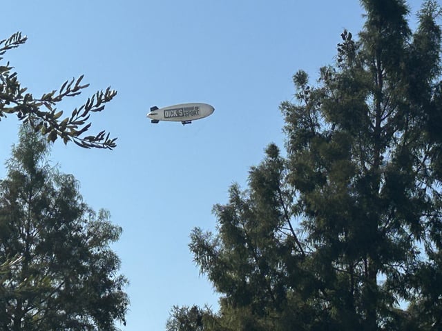 Dicks Sporting Goods blimp flying over North Austin