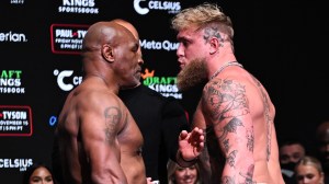 IRVING, TEXAS - NOVEMBER 14: Mike Tyson and Jake Paul faceoff during Weigh-In at the Toyota Music Factory in Irving, Texas on November 14, 2024 ahead of their match for heavyweight world titles of the Premiere Boxing Championship which will be on November 15 Friday night at AT&T Stadium in Arlington, Texas, United States.