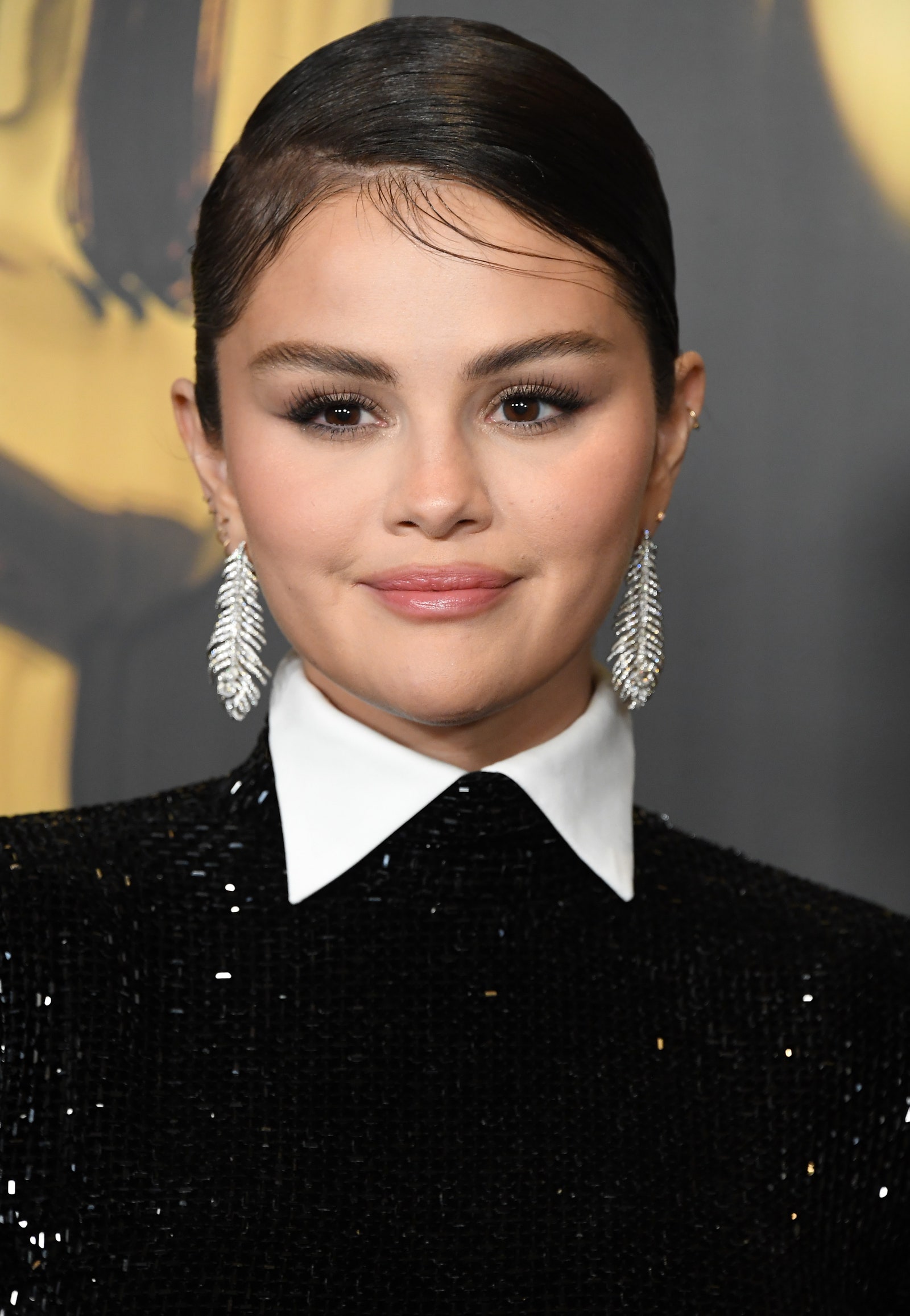 Image may contain Selena Gomez Face Head Person Adult Hair and Black Hair