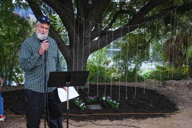 Will Hyatt, a pastor and volunteer chaplain for House the Homeless, speaks at a memorial service at Auditorium Shores on Sunday, Nov. 17, 2024 in Austin. Advocates and members of the homeless community gathered to honor the more than 200 homeless people that died between September of 2023 and November of 2024.