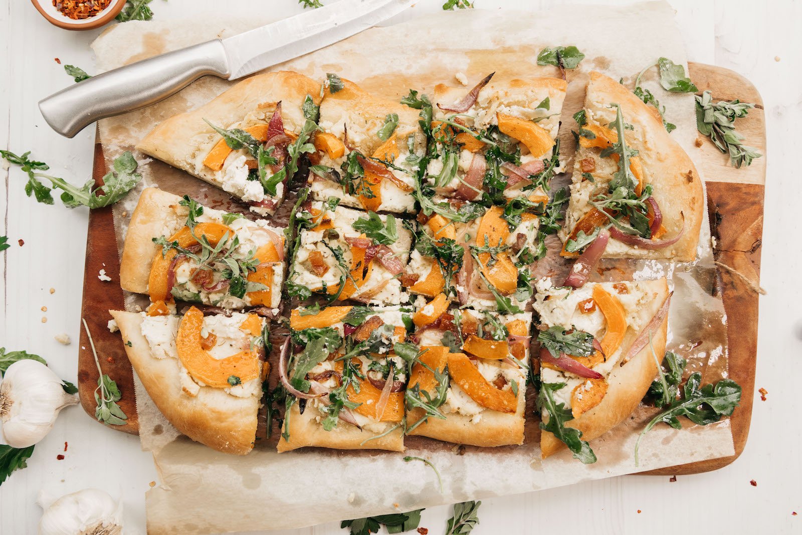 butternut squash pizza with arugula & almond ricotta