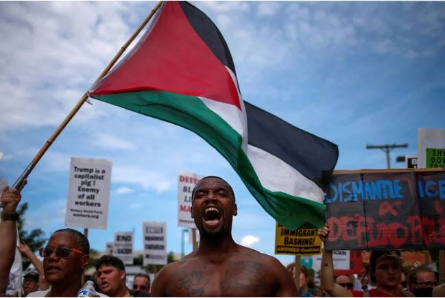 black-demonstrators-waving-palestinian-flag-chant-black-lives-matter-in-runup-to-republican-national-convention-in-cleveland-2016-by-adrees-latif-reuters, ‘Understanding Hamas and Why That Matters’, World News & Views 