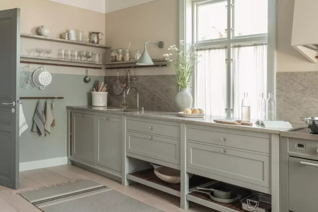 Sage green on a portion of the kitchen walls for a two-tone effect