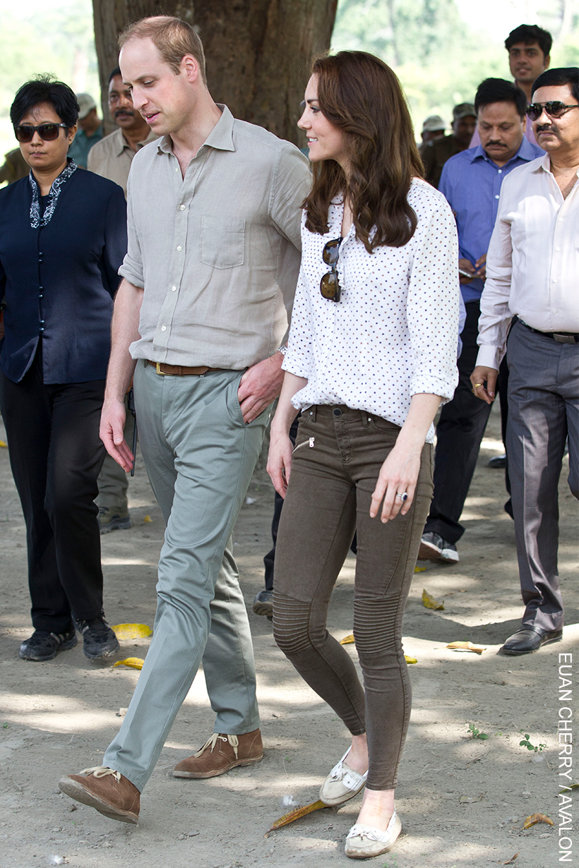 Kate Middleton looks chic in khaki jeans and a spotty blouse for this engagement