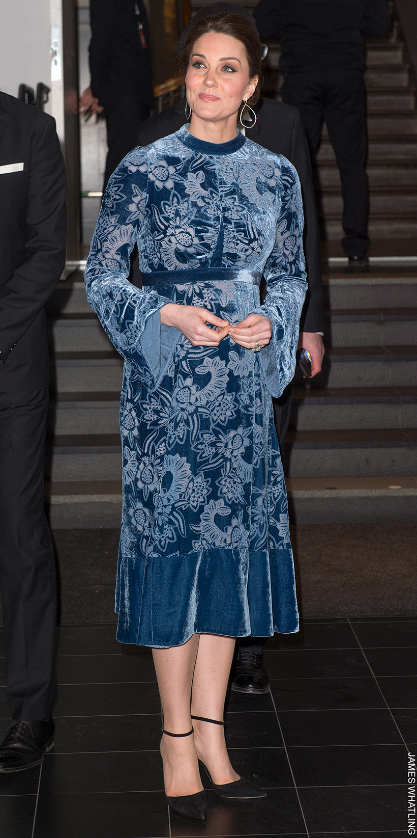 Pregnant Kate Middleton wearing a floral blue velvet dress by Erdem