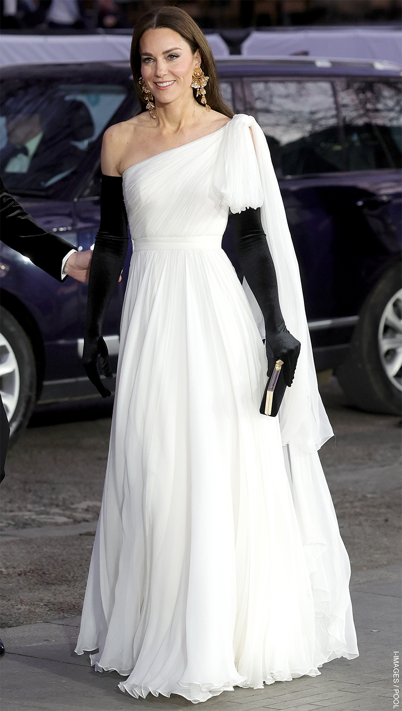 The Princess of Wales in a white gown with black gloves