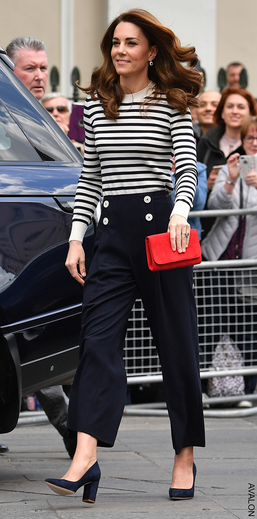 Kate Middleton wearing cropped nautical style trousers with a striped knit