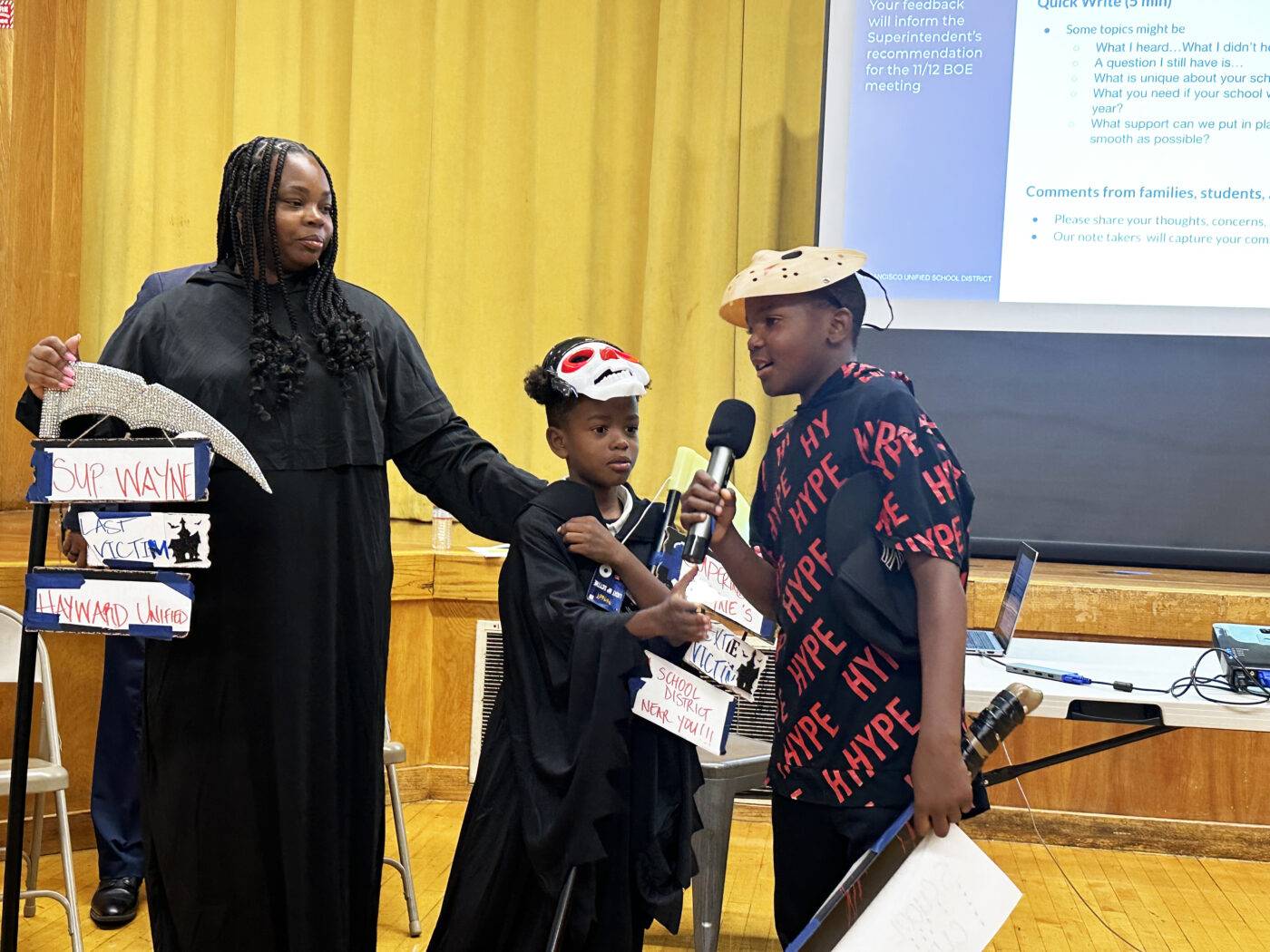 malcolm-x-academy-anti-closure-meeting-101724-latoya-pitcher-her-children-by-kevin-epps-1400x1050, Safeguarding the future: Why Malcolm X Elementary School deserves our support, Featured Local News & Views 