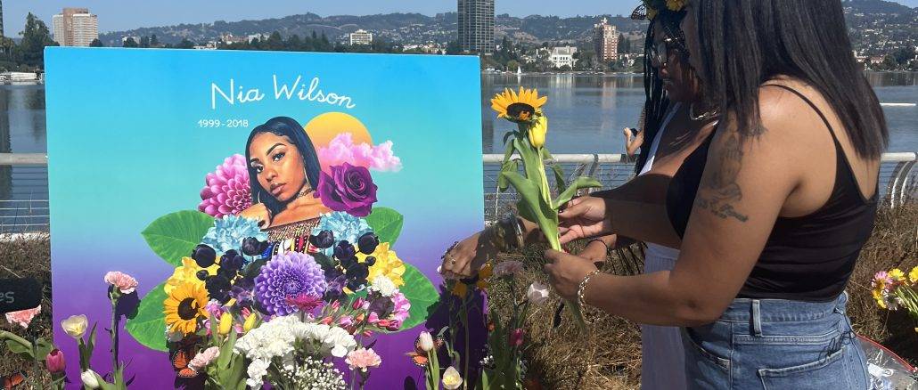 tomisha-wilson-alie-jones-build-altar-honoring-nia-wilson-at-lake-merritt-amphitheater-by-kristal-raheem, Black Tulip calls for action and a cultural shift in Oakland for Black women’s safety, Local News & Views 