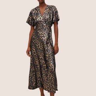 flat lay image of woman wearing leopard print dress