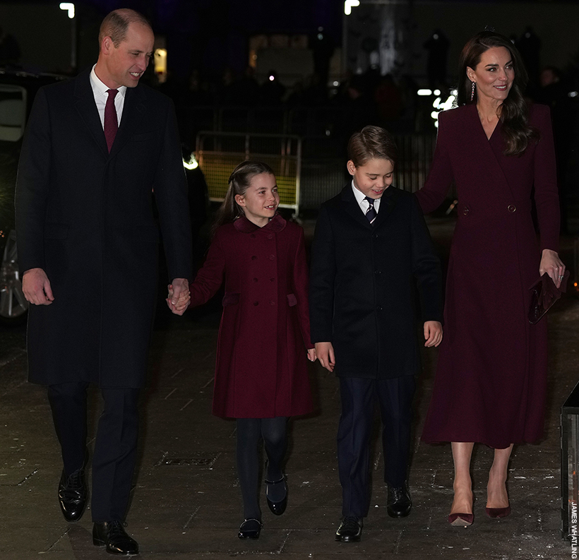 The Prince and Princess of Wales with their children at the 2022 'Together At Christmas' Concert. The family match in coordinating tones of burgundy