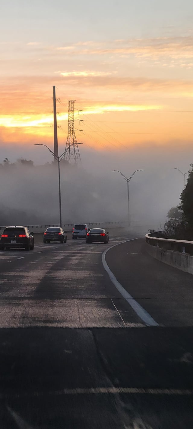 Foggy sunrise by the dam