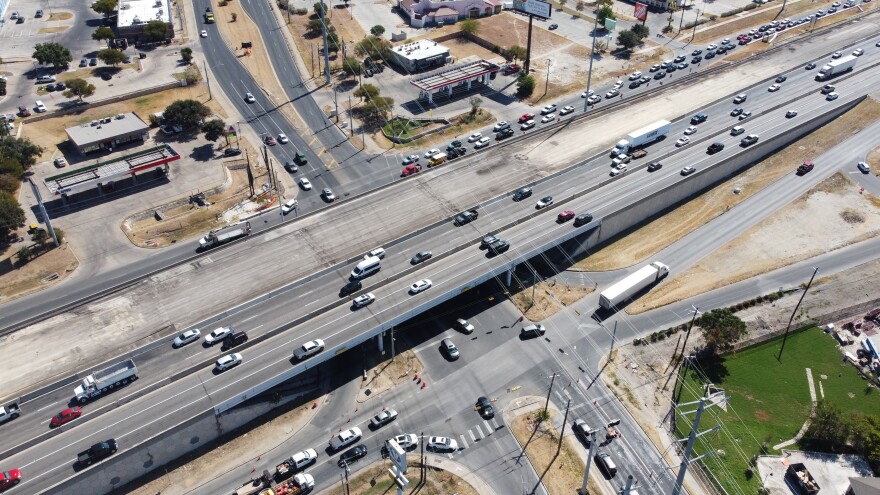 Aerial view of the I-35 and Howard Lane intersection showing the northbound bridge already demolished. 