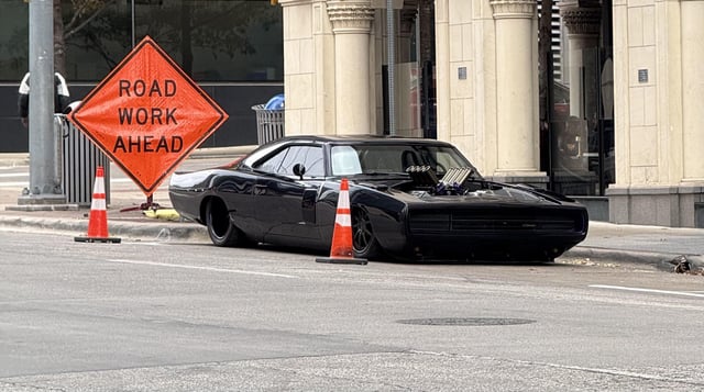 Saw this awesome old charger downtown at Perry’s today. Paparazzi, taking photos of the driver. Any idea whose car? 