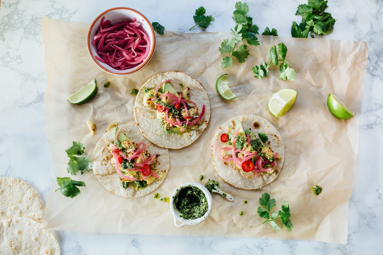 Roasted Cauliflower Tacos with Cilantro Pesto - a healthy, delicious (vegetarian!) way to satisfy those taco cravings