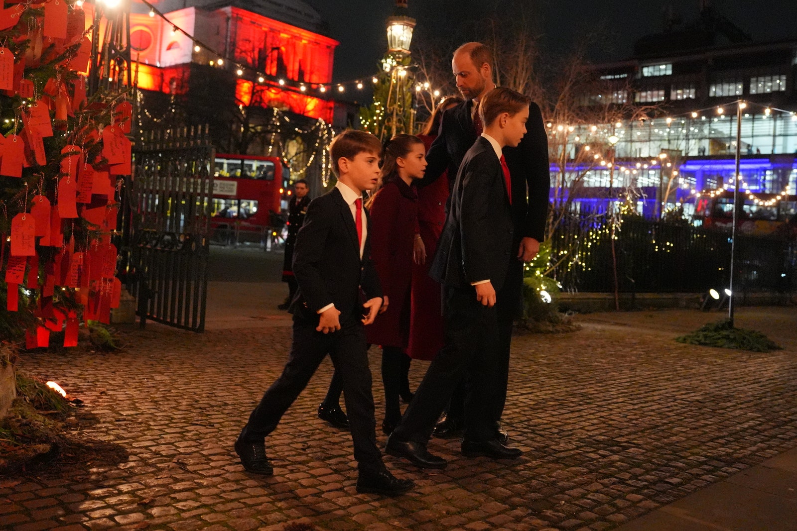 Image may contain Prince William Duke of Cambridge City Road Street Urban Person Walking Clothing and Coat