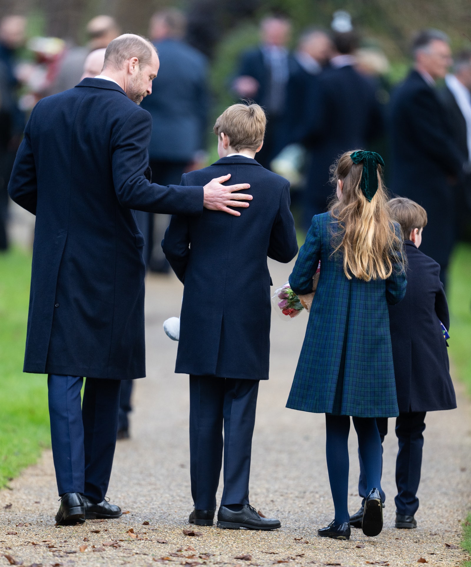 Image may contain Prince William Duke of Cambridge Clothing Coat Footwear Shoe Adult Person People and Child