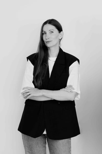 Sofie Dolva, director of Copenhagen International Fashion Fair (CIFF), stands before a white backdrop.