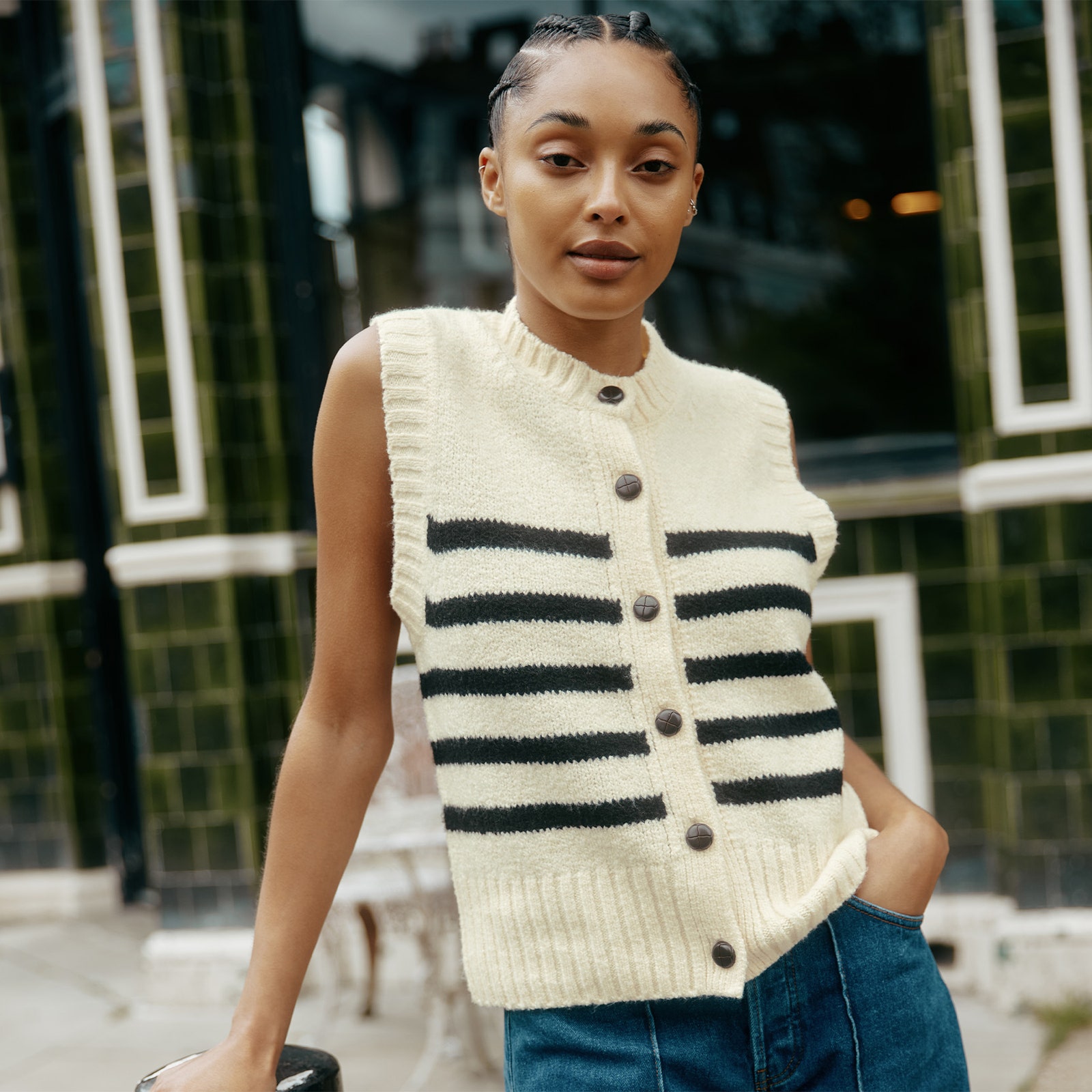 Image may contain Anais Mali Clothing Knitwear Sweater Vest Person and Teen