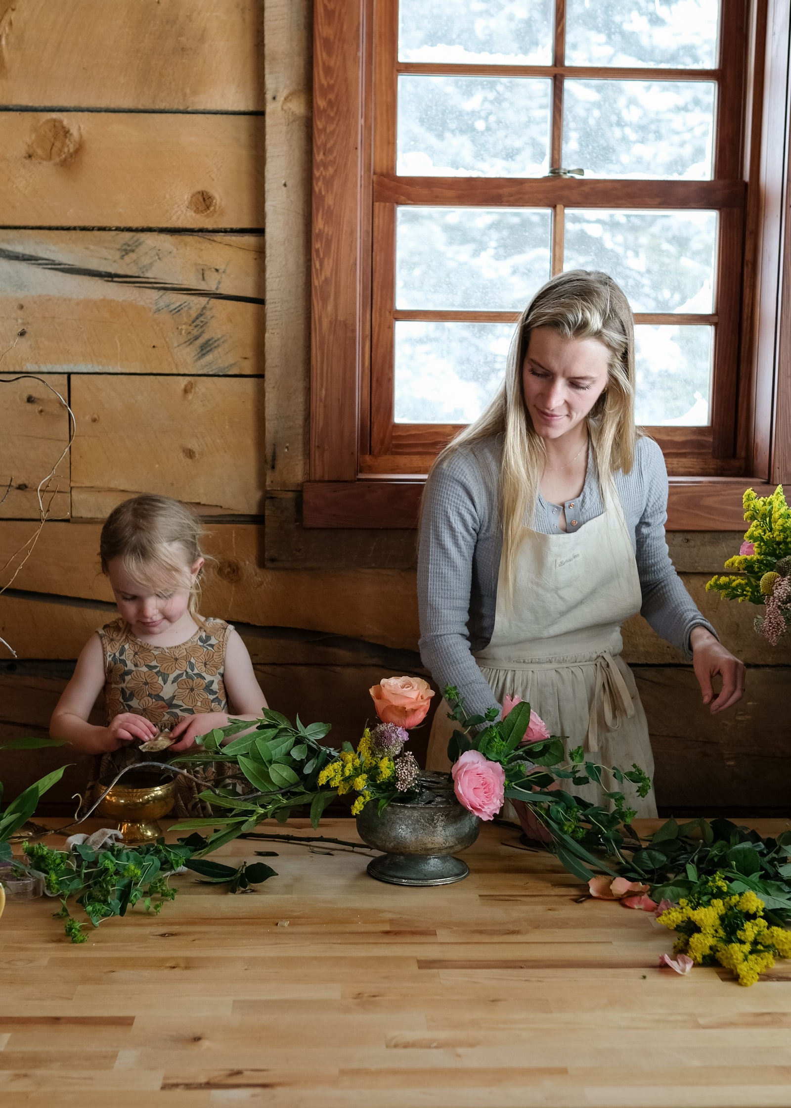 Image may contain Wood Flower Flower Arrangement Plant Potted Plant Hardwood Flower Bouquet Pottery Jar and Ikebana