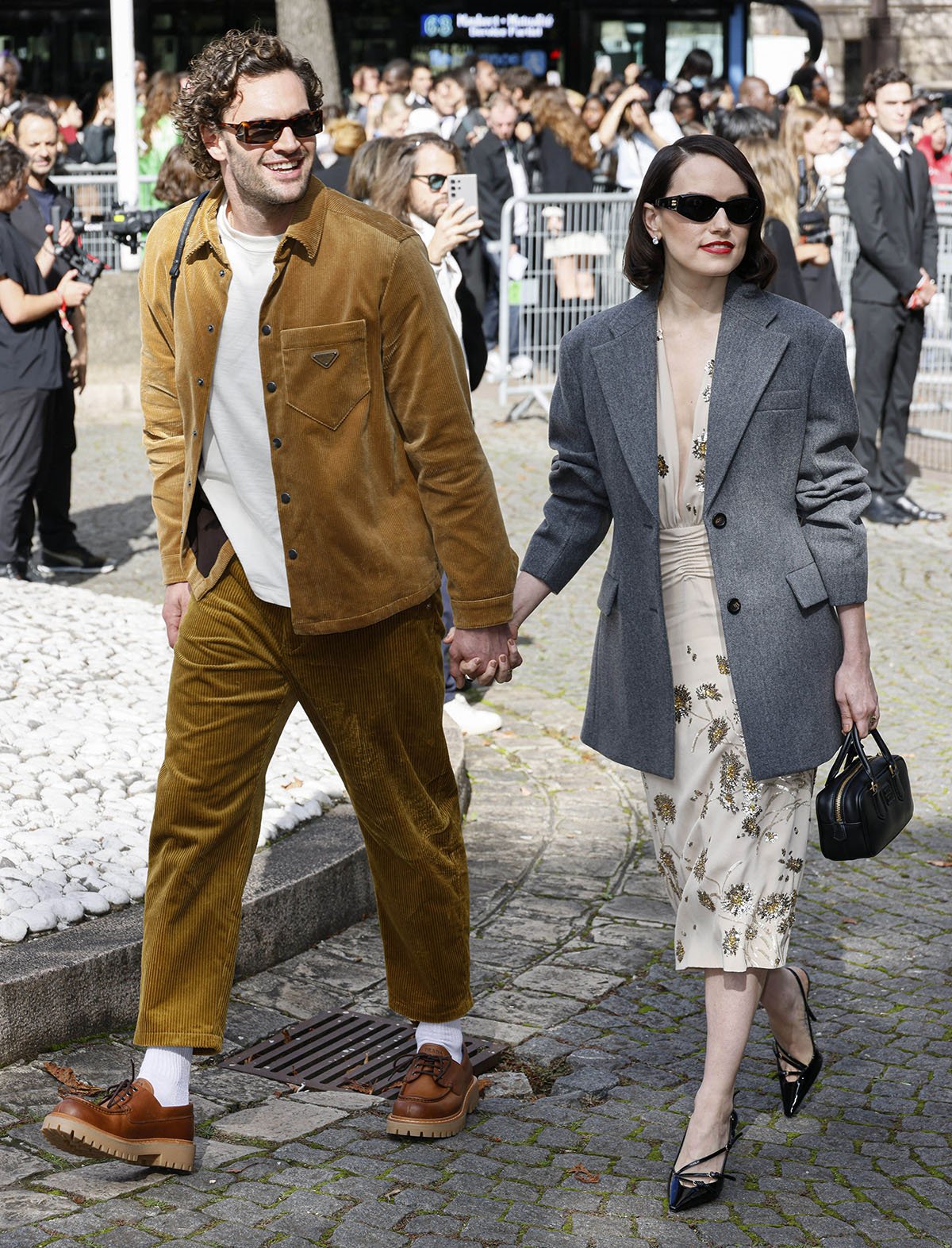 Tom Bateman and Daisy Ridley attend the Miu Miu Paris Womenswear S/S 2025 show as part of Paris Fashion Week in October 2024