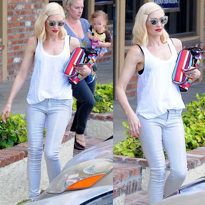 Gwen Stefani keeps it effortlessly chic in skinny snake-print pants and a white tank while exiting an acupuncture clinic in Los Angeles on March 16, 2015