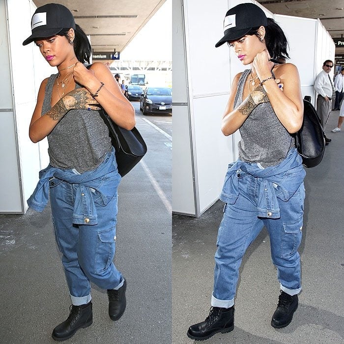 Rihanna pairs her Timberland boots with a casual gray tank, cuffed overalls, and a snapback for a chic and comfy airport look