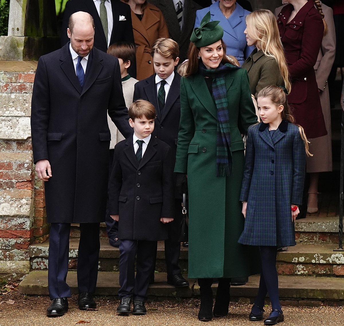 Kate Middleton looks elegant in her custom green Alexander McQueen double-breasted coat with notched lapels and front pockets