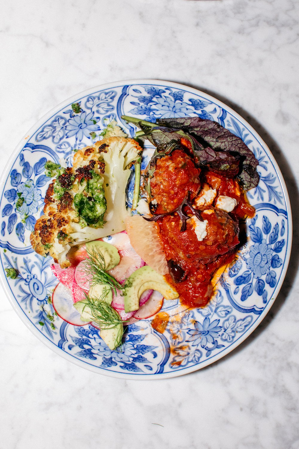 lamb meatballs in tomato sauce with fresh ricotta