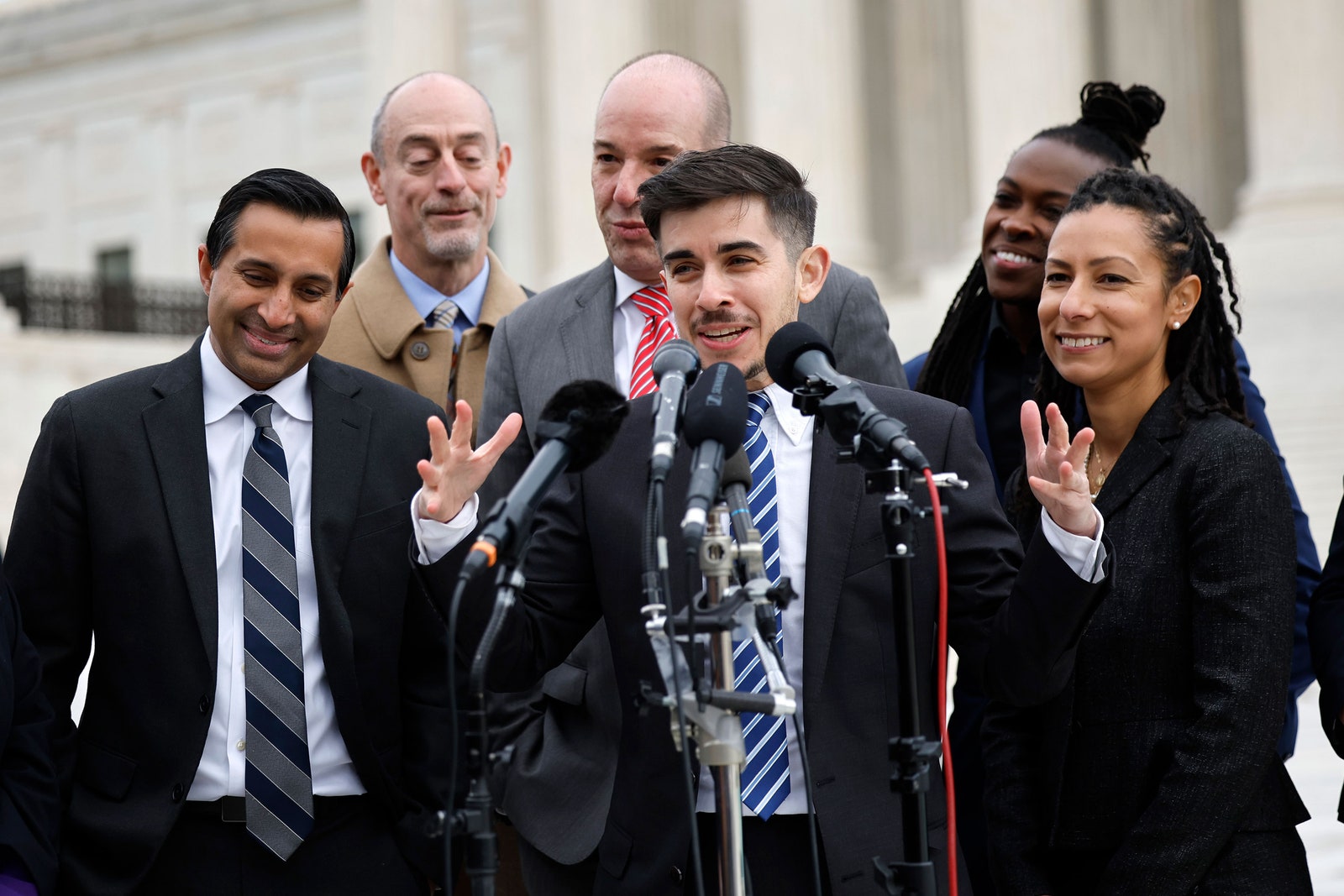 Image may contain Anthony Romero Accessories Formal Wear Tie Electrical Device Microphone People Person and Crowd