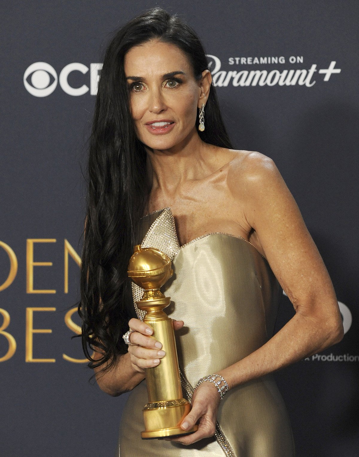 Demi Moore wins the Golden Globe for Best Actress in a Picture Comedy or Musical for her role in the body horror movie The Substance