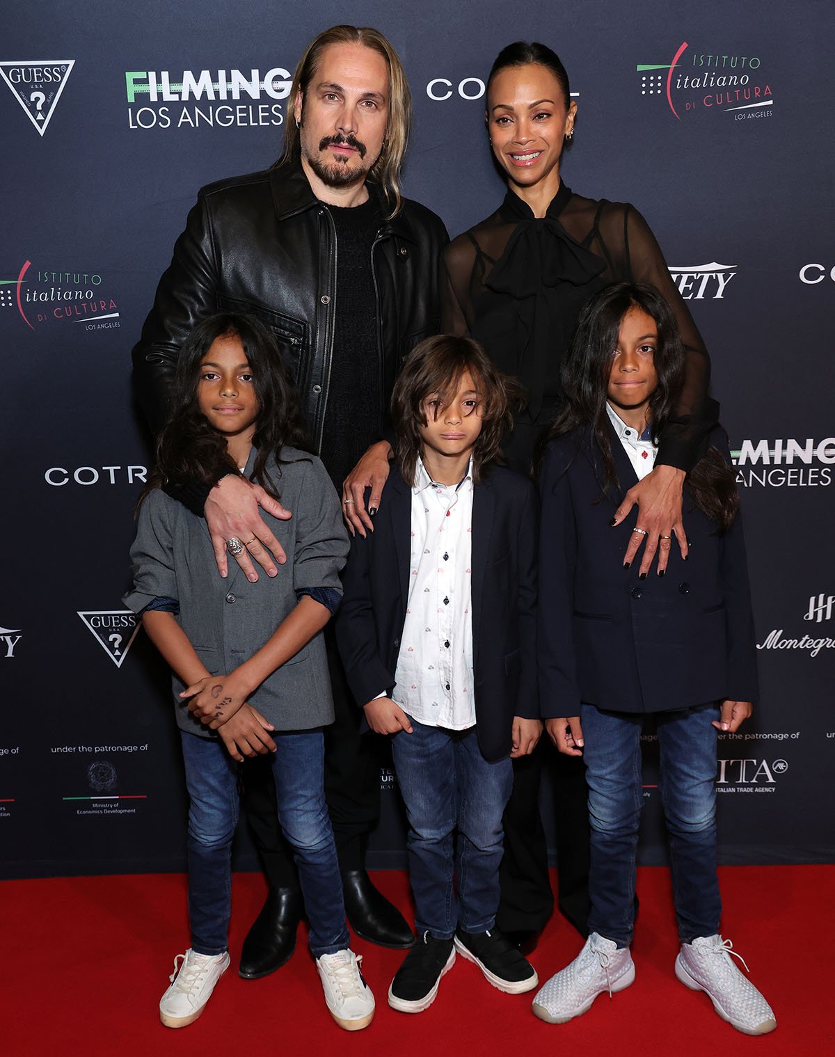 Marco Perego and Zoe Saldana with their kids Bowie Ezio, Cy Aridio, and Zen Perego-Saldana at the 10th Annual Filming Italy Los Angeles Festival opening ceremony at the Directors Guild Of America