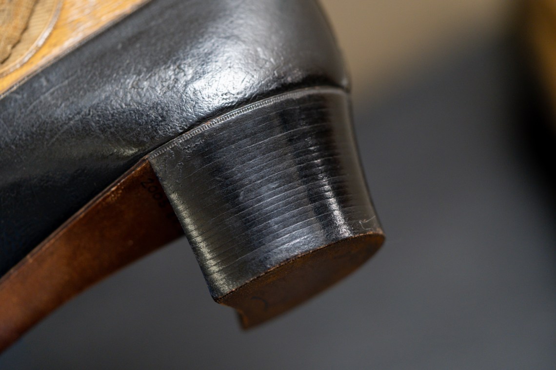 Here we have many really thin lifts building up the high heel. Very neatly made.